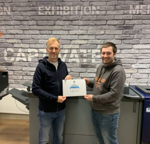 Print Scotland Apprentice Award winner 2022 Christopher Dinnes from Captivate Creative with Managing Director Andrew Dinnes